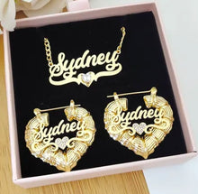Load image into Gallery viewer, A set of gold-plated heart-shaped jewelry including a necklace and earrings, with the name 'Sydney' inscribed on them, presented in a box.