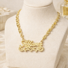 Load image into Gallery viewer, Gold necklace with 'Tiffany pendant on a mannequin bust.