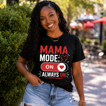 Load image into Gallery viewer, Woman wearing a black t-shirt with 'Mama Mode: On Always On' text, standing outdoors.