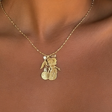 Load image into Gallery viewer, A women wearing Betty Boop sitting on a cherry gold necklace