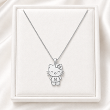 Load image into Gallery viewer, Silver Hello Kitty necklace on a white display box