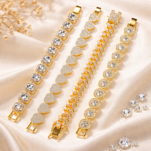 Load image into Gallery viewer, Gold and crystal bracelet on a beige fabric background
