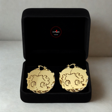 Load image into Gallery viewer, 18k Gold-Plated Betty earrings in a black box with a visible brand logo on a light gray background