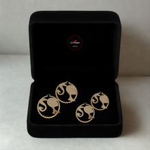 Load image into Gallery viewer, Set of four gold and silver Barbie-themed earrings in a black box with a visible brand logo.