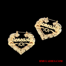 Load image into Gallery viewer, Gold heart-shaped personalized earrings with 'name' inscription on a black background