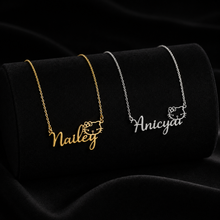 Load image into Gallery viewer, Necklaces with the name in goldv "Nailey" and silver "Aniciya" with a kitty face at the top end of name