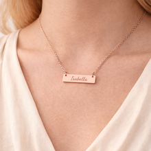 Load image into Gallery viewer, Rose gold necklace with engraved name 'Isabella' on a person wearing a white top.