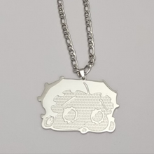 Load image into Gallery viewer, Silver Betty Boop necklace with a detailed pendant on a gray background