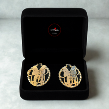 Load image into Gallery viewer, Gold Munnie Mouse earrings in a black box on a light gray background