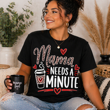 Load image into Gallery viewer, Woman wearing a black t-shirt with 'Mama Needs a Minute' text, holding a black mug.

