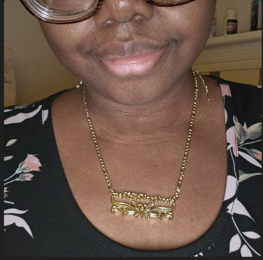 Customer wearing a gold personalized butterfly necklace