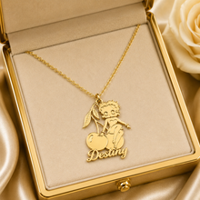 Load image into Gallery viewer, Custom made Betty Boop sitting on a cherry gold personalized necklace with the name "Destiny" in a gold jewelry box.
