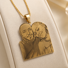 Load image into Gallery viewer, Gold pendant with engraved portrait on a beige cushion
