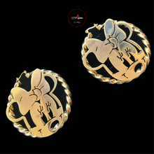 Load image into Gallery viewer, Gold Munnie Mouse-shaped earrings on a black background
