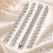 Load image into Gallery viewer, Silver bracelet with clear gemstones on a beige fabric background
