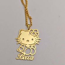 Load image into Gallery viewer, Gold Hello Kitty pendant with 'Becca' on a gray background
