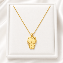 Load image into Gallery viewer, Gold Hello Kitty necklace in a white display box

