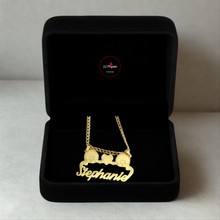 Load image into Gallery viewer, Gold necklace with monkey 'Stephanie' in a black jewelry box on a light gray background
